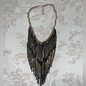 Black and gold dangling statement necklace